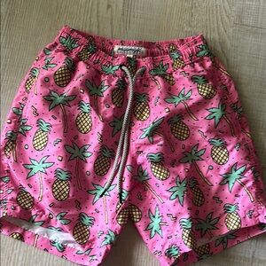 Vibrant Pink and Green Swim Trunks with Tropical Flair